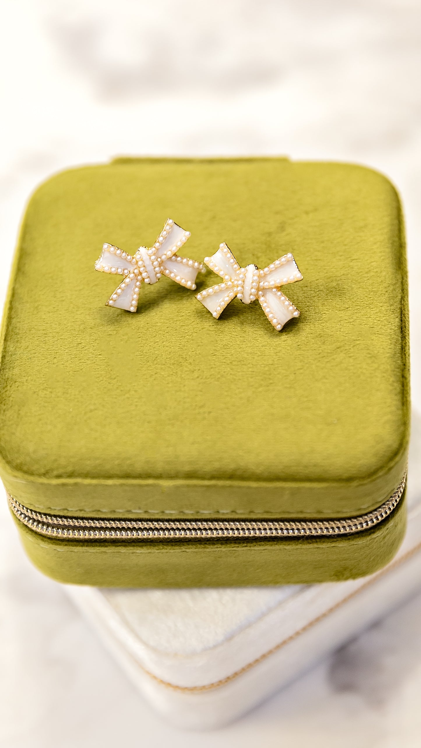 Pearlescent Bow Statement Studs