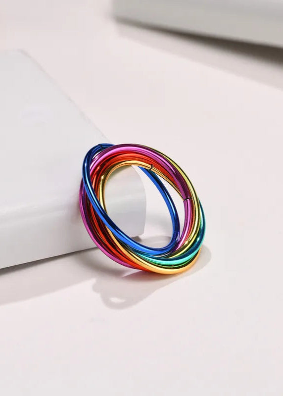 Multicolored ring on a white surface