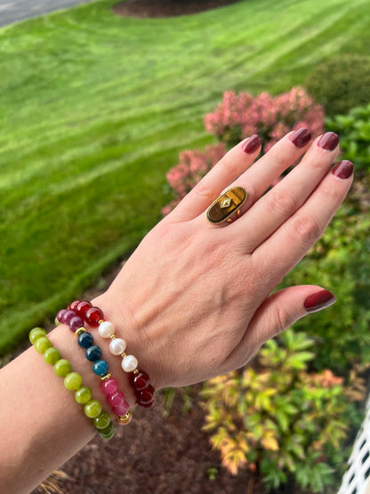 Colorful bracelets layered on the wrist from the VEITA Jewelry Alchemy Collection Fall 2026