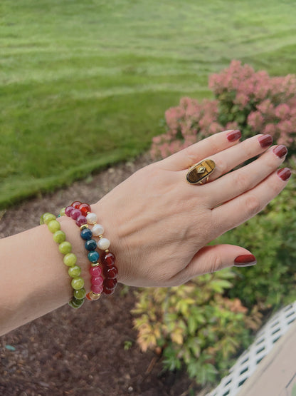 VEITA Jewelry Alchemy Collection Fall 2026 colorful gemstone bracelet stack styled outdoors