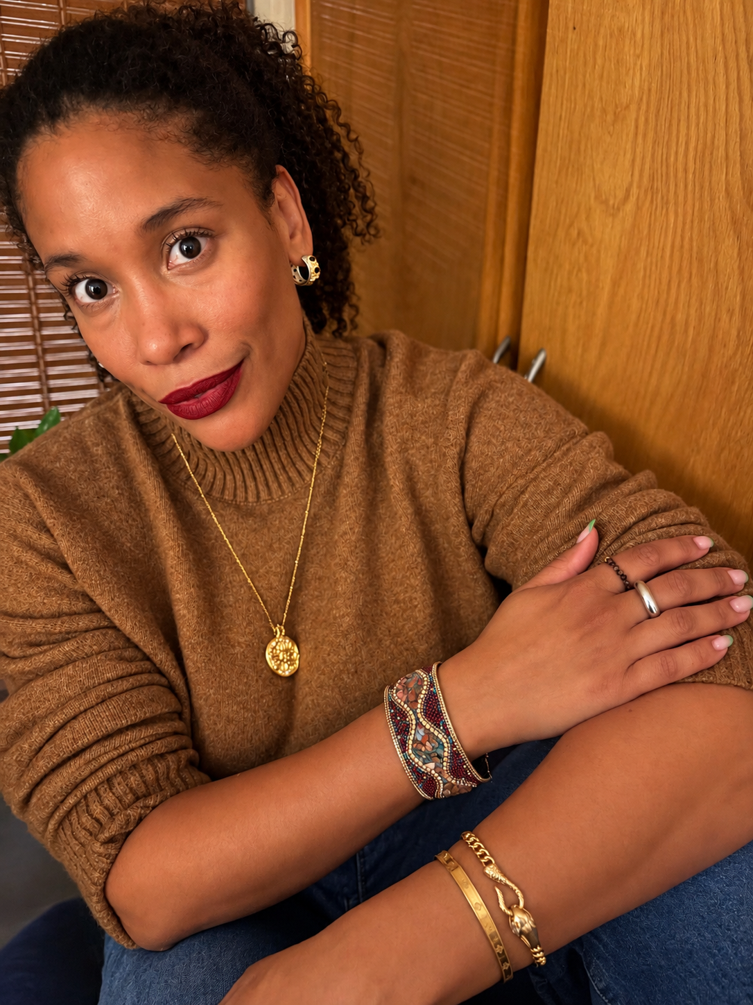VEITA Jewelry Alchemy Collection Fall 2026 jewelry styled on model with layered bracelets and necklaces