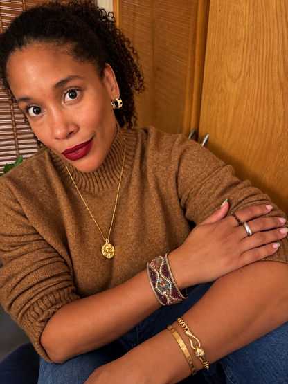 VEITA Jewelry Alchemy Collection Fall 2026 jewelry styled on model with layered bracelets and necklaces