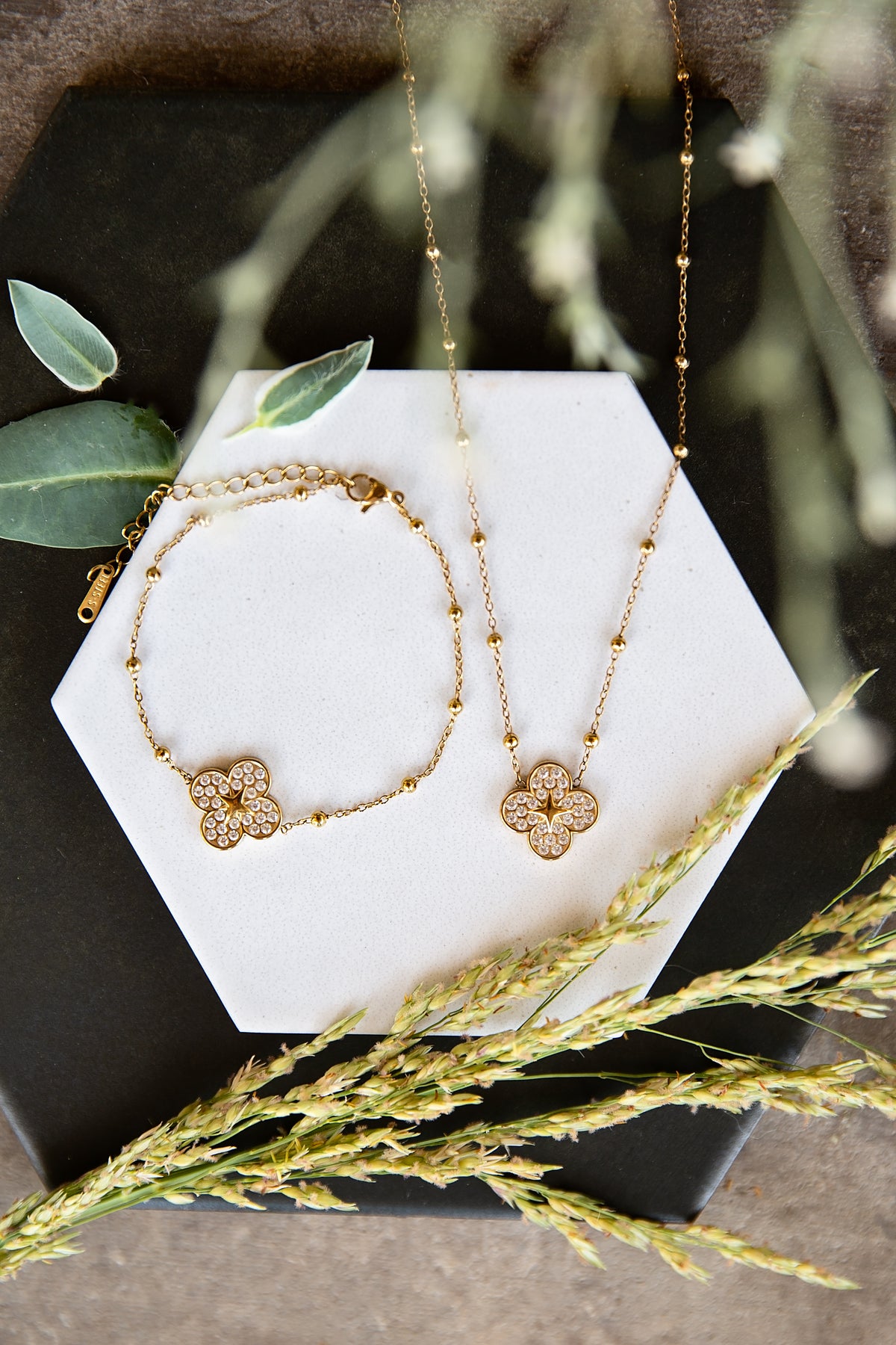 VEITA Jewelry Alchemy Collection Fall 2026 featuring layered gold jewelry from the seasonal launch with Clover Necklace and Bracelet 