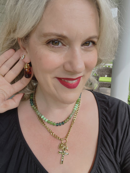 Model wearing the VEITA Jewelry Arden Necklace and Senna Hoops featuring genuine green stones