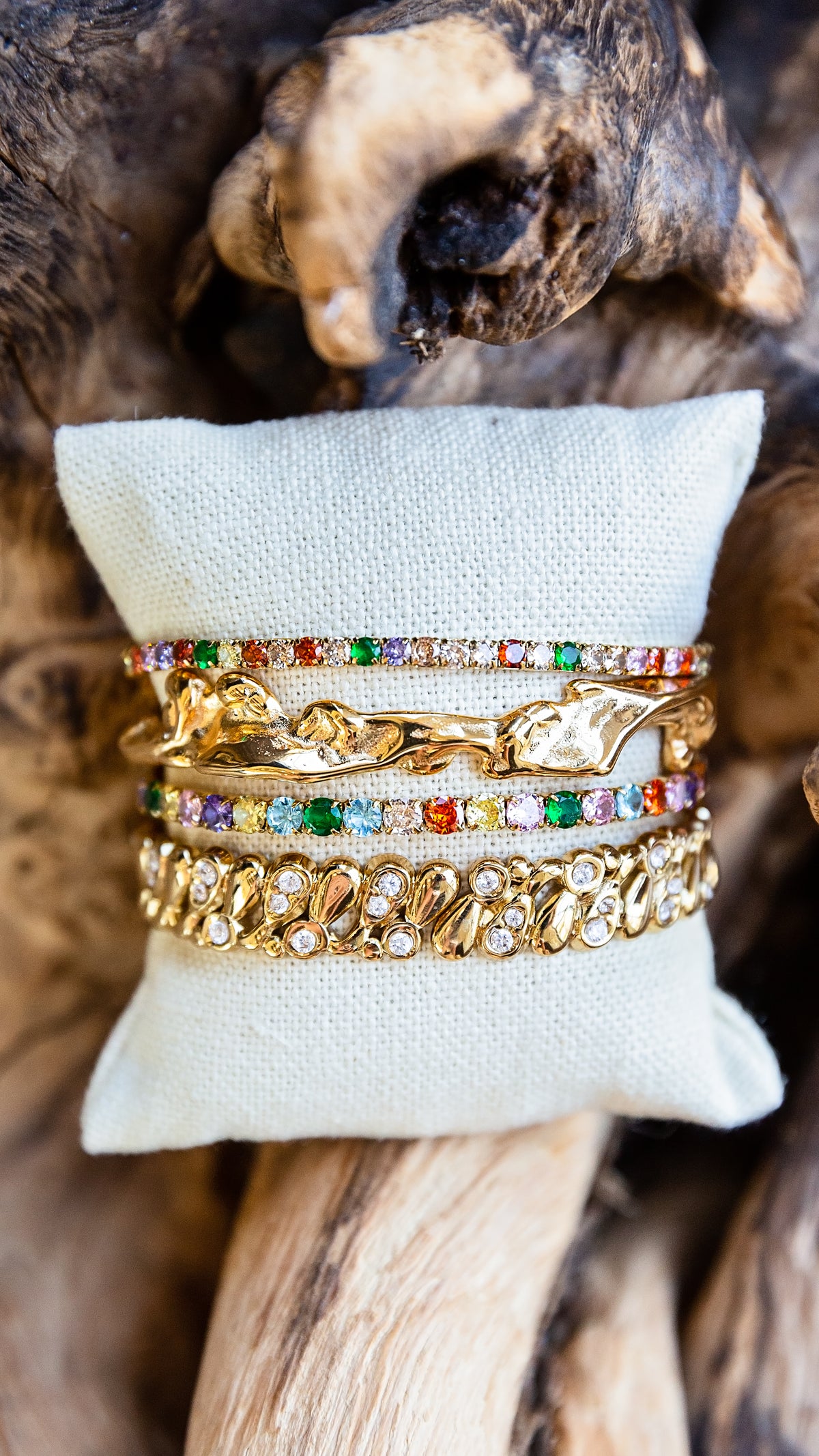 VEITA Jewelry Celeste Stretch Bracelet in Multi layered in a colorful gold bracelet stack