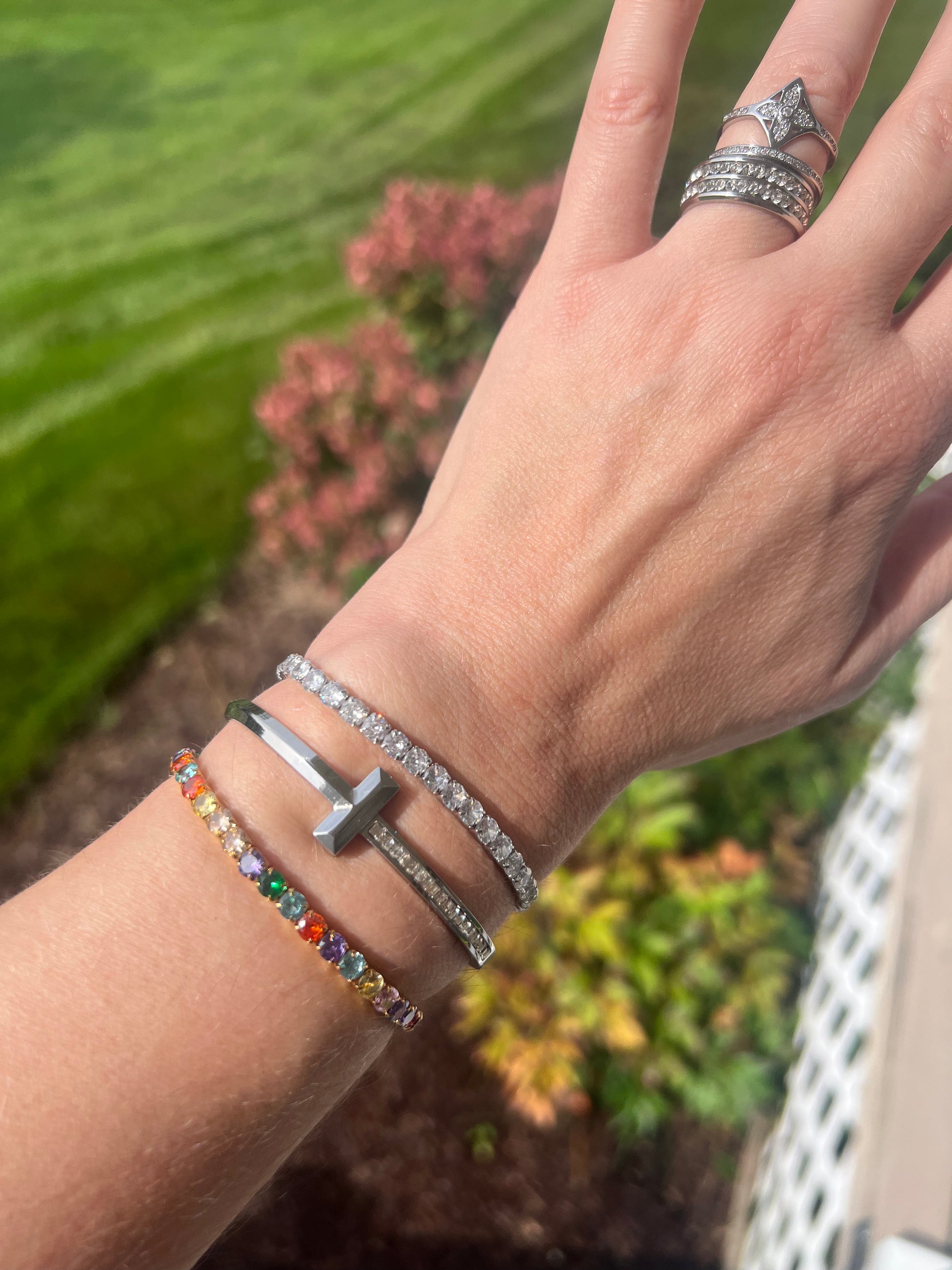 VEITA Jewelry Celeste Stretch Bracelet in Multi styled with layered gold bracelets on wrist