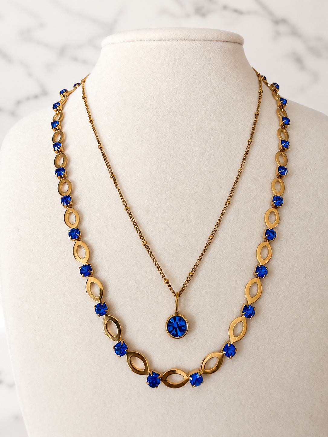 Styled image with Classic Birthstone Necklace and Poolside Luxe Necklace