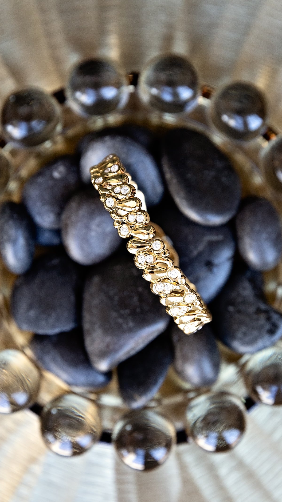 Close-up of the VEITA Jewelry Dolly Bangle showing gold detailing and sparkling zircon stones