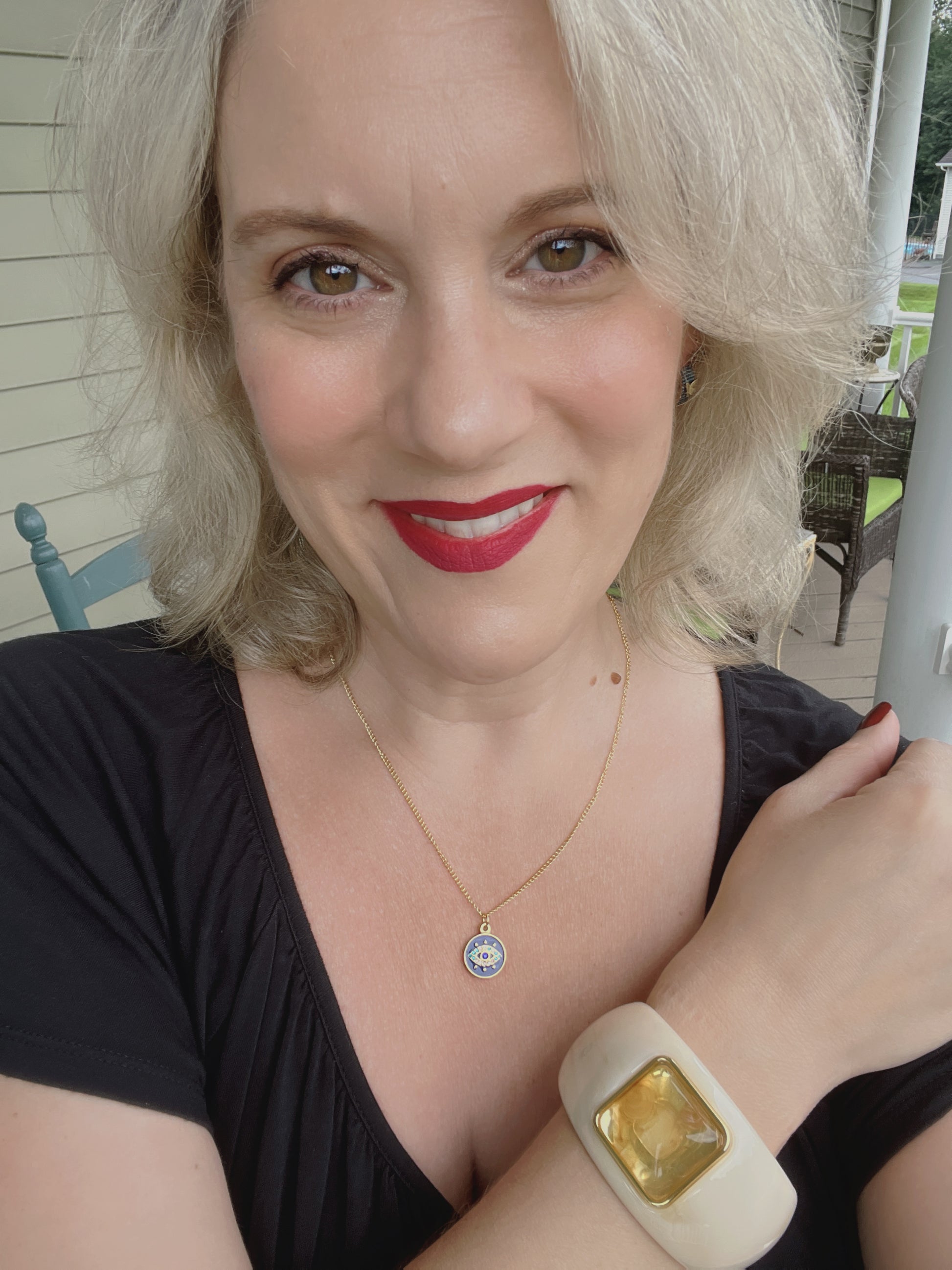VEITA Jewelry Dune Bangle worn on wrist featuring chunky ivory and amber resin