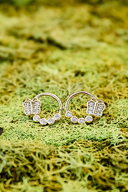 Eris micro stud earrings featuring small butterfly design with zircon stones and gold plated finish for second piercing or layering