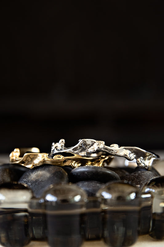 Close-up of VEITA Jewelry mixed metal bracelet featuring polished gold and silver details