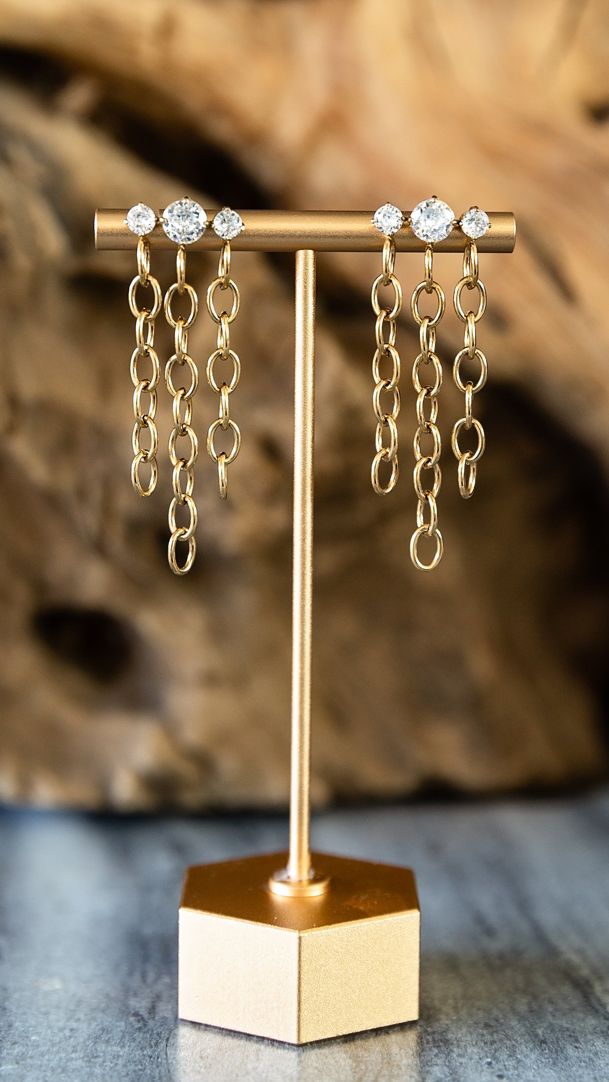 VEITA Jewelry Ignite Earrings featuring zircon stones and long gold chain-link drops