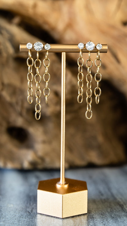 VEITA Jewelry Ignite Earrings featuring zircon stones and long gold chain-link drops