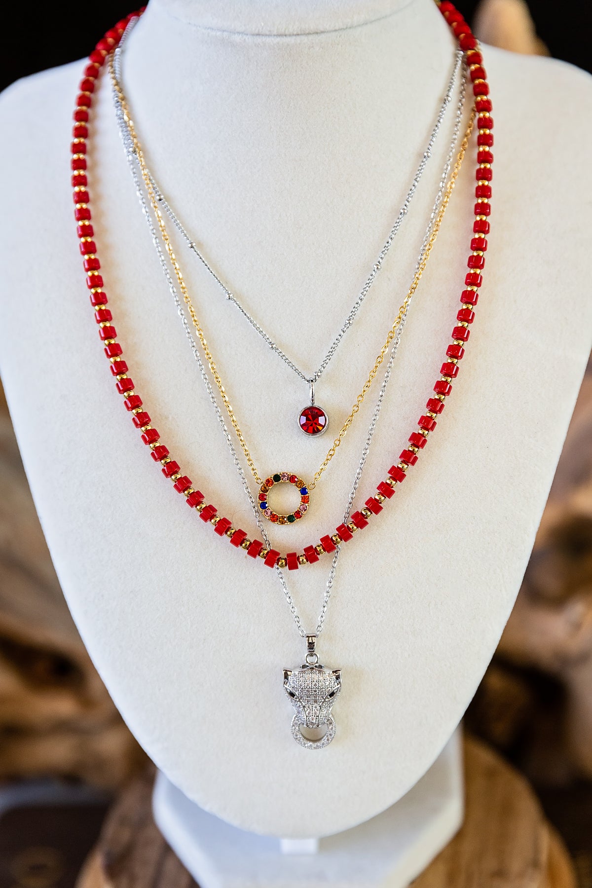 Model wearing the delicate Mosaic Necklace with colorful zircon pendant
