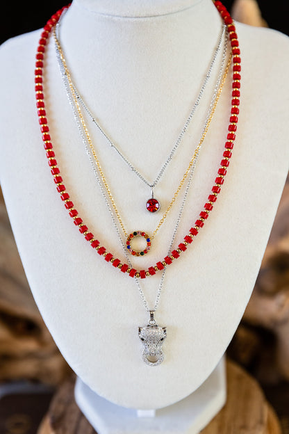 Model wearing the delicate Mosaic Necklace with colorful zircon pendant