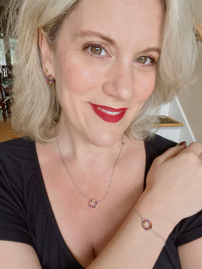 Model wearing VEITA Jewelry Mosaic Stud Earrings with colorful zircon stones
