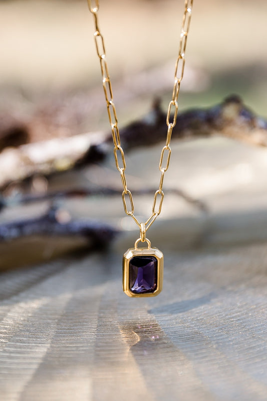 Nightfall necklace featuring gold chain with rectangular zircon pendant in deep tone for a refined minimalist look