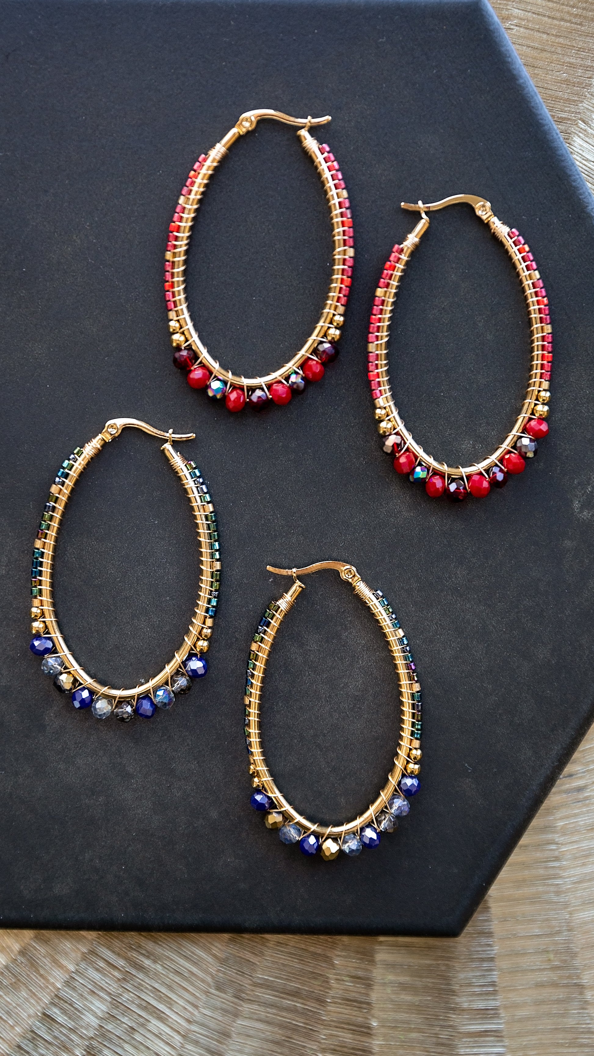 VEITA Jewelry Noemi Beaded Hoops shown in burgundy and blue glass bead color options with 18kt gold plating.