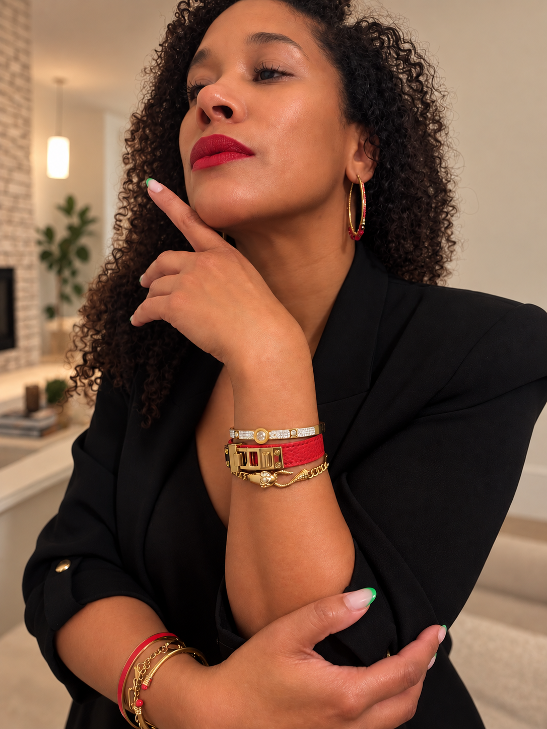 VEITA Jewelry Ouro Bangle worn as part of a layered gold bracelet stack