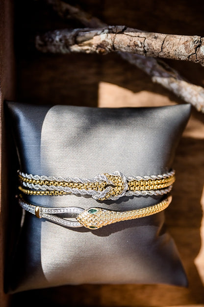 Parker mixed metal bracelet styled with other gold and silver bracelets, showing layered stack styling for everyday wear