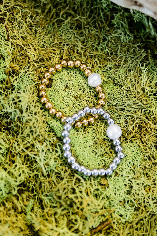 Pearl stretch ring featuring genuine freshwater pearls and gold beaded design in a flexible stackable style