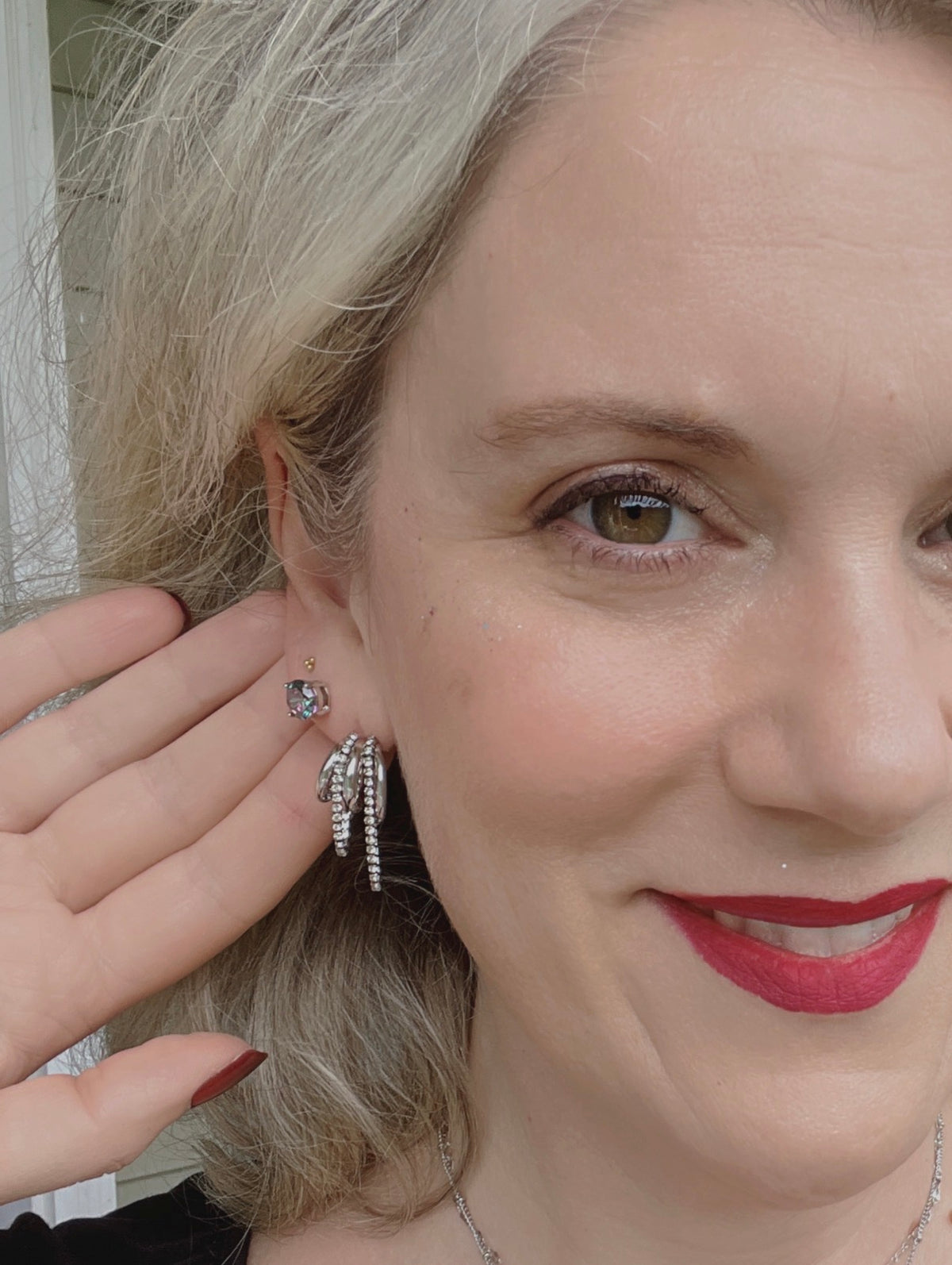 Model wearing the VEITA Jewelry Rainbow Quartz Studs for a colorful everyday earring look