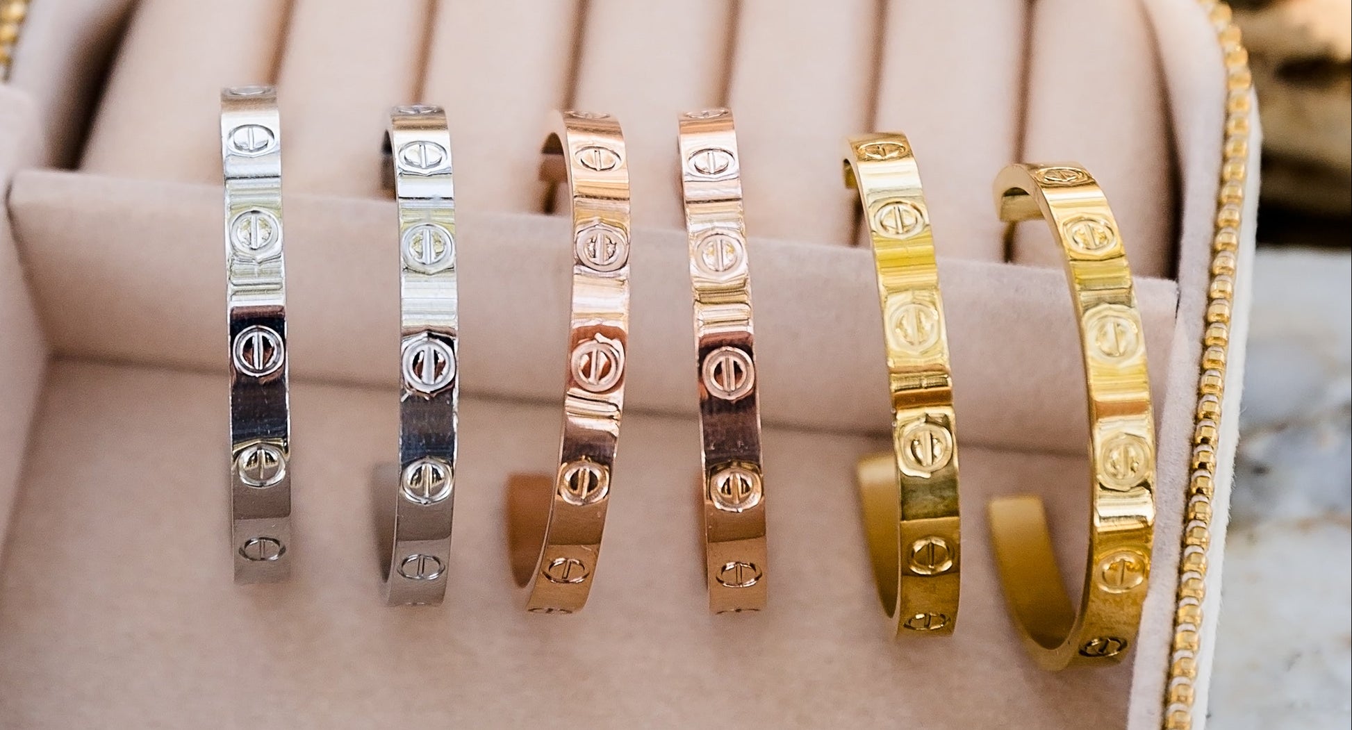 Sabine hoop earrings close up showing textured surface and structured gold hoop design