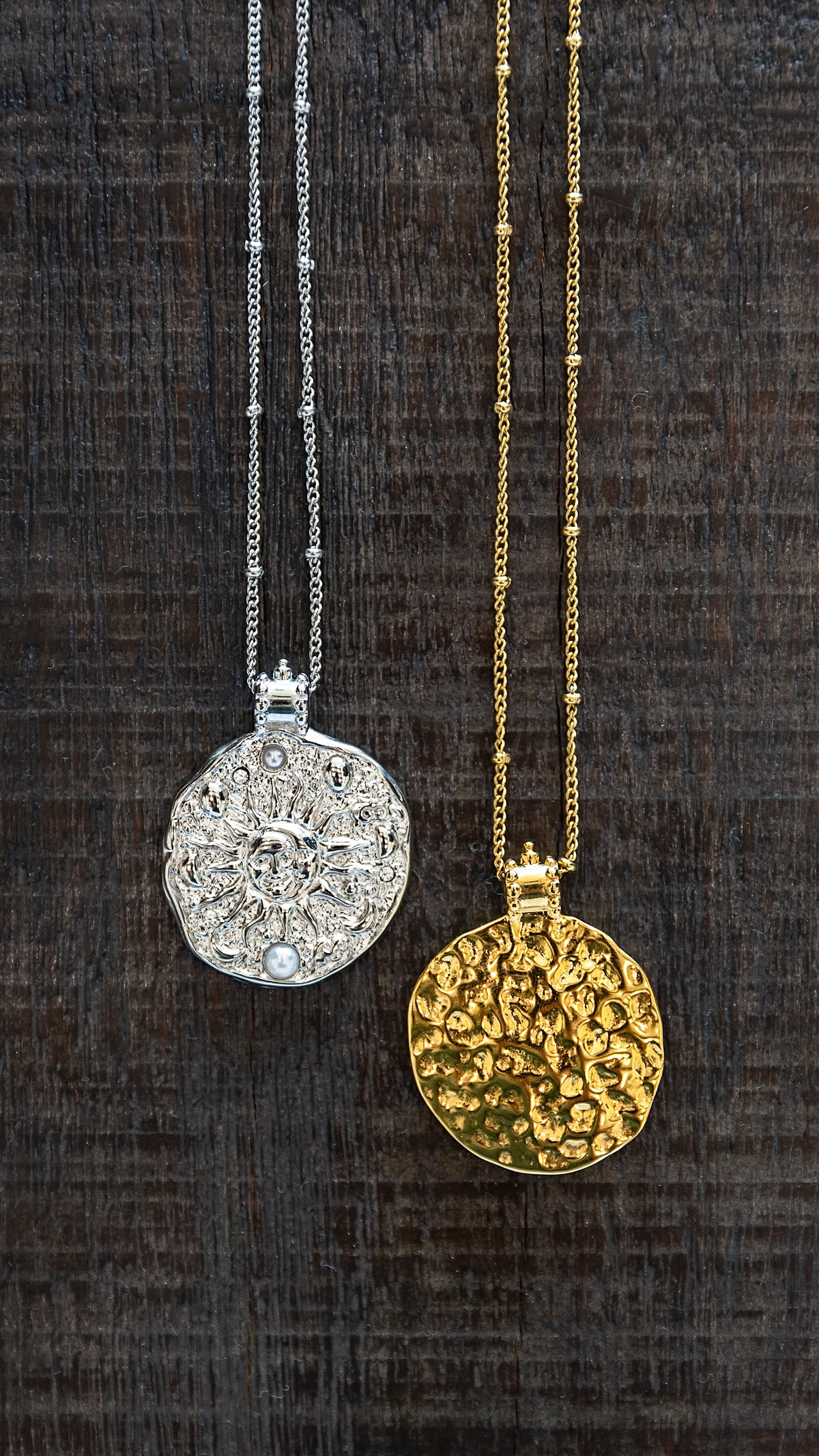 Solana Necklace displayed in both silver and gold finishes with delicate chains and celestial pendants
