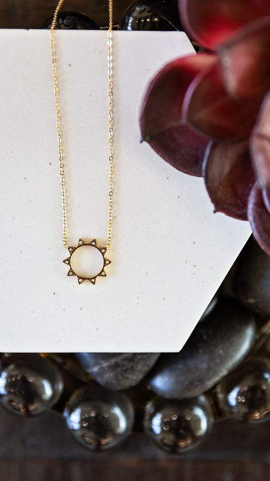 VEITA Jewelry Solstice Necklace featuring a delicate gold sun pendant accented with micro zircon stones