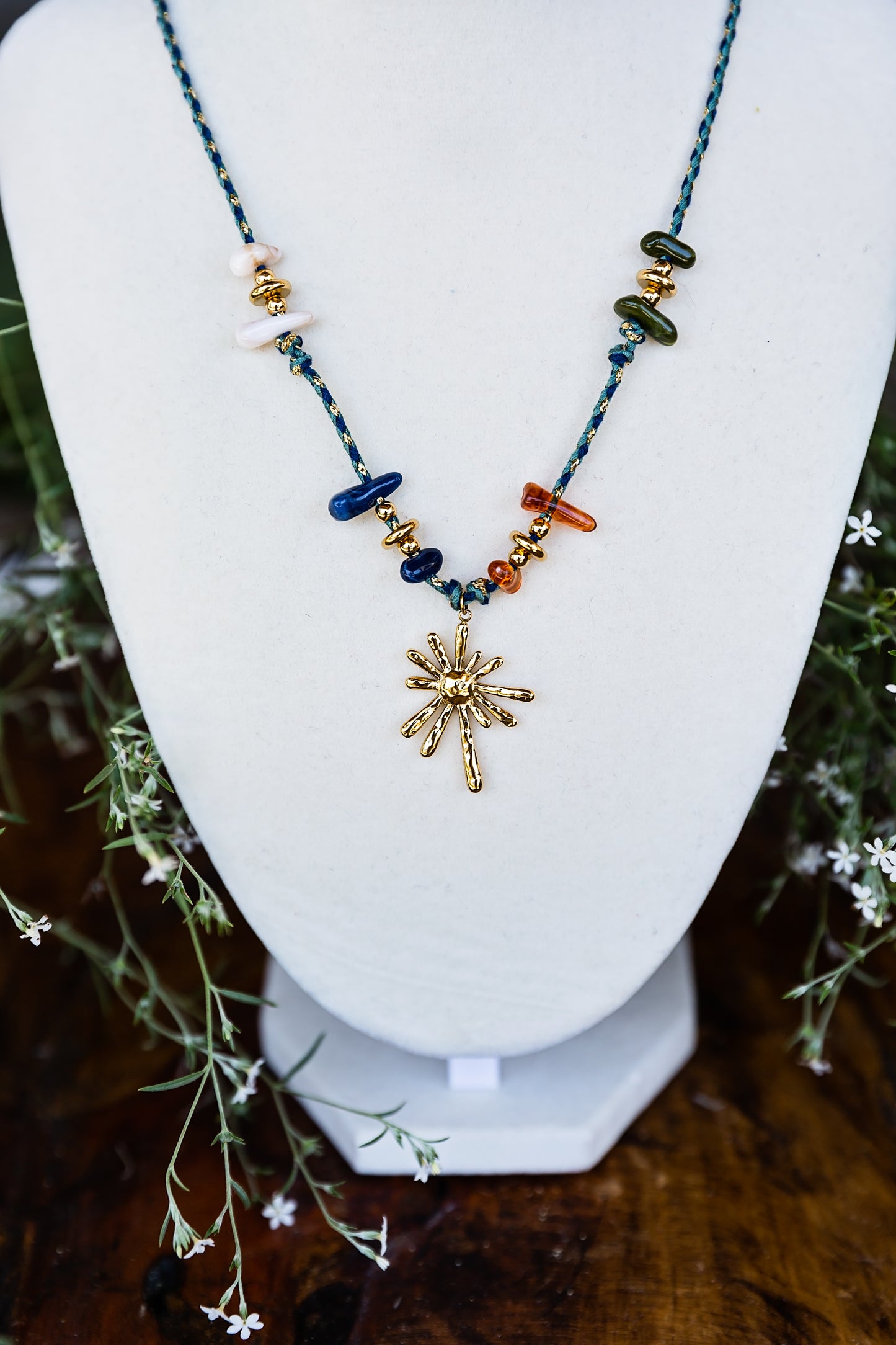 VEITA Jewelry Terra Necklace featuring natural gemstones, hand-knotted cord and a gold sun pendant