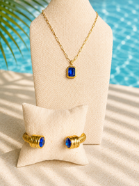 Styled look showing the 2026 Poolside Collection by Veita featuring Romy Cuff in Bright Blue and Nightfall Necklace in Blue.