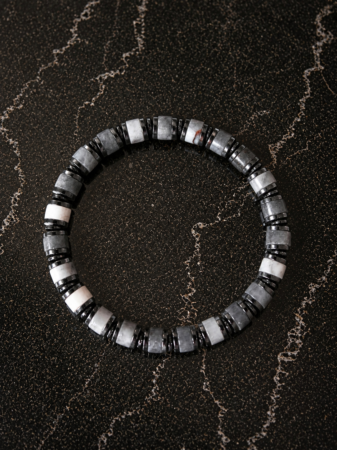 Wayfinder beaded bracelet in Grey Agate  featuring genuine gemstone beads and hematite accents in a comfortable stretch design.