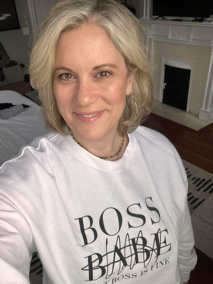 Model wearing VEITA Jewelry colorful beaded choker necklace and gold hoop earrings