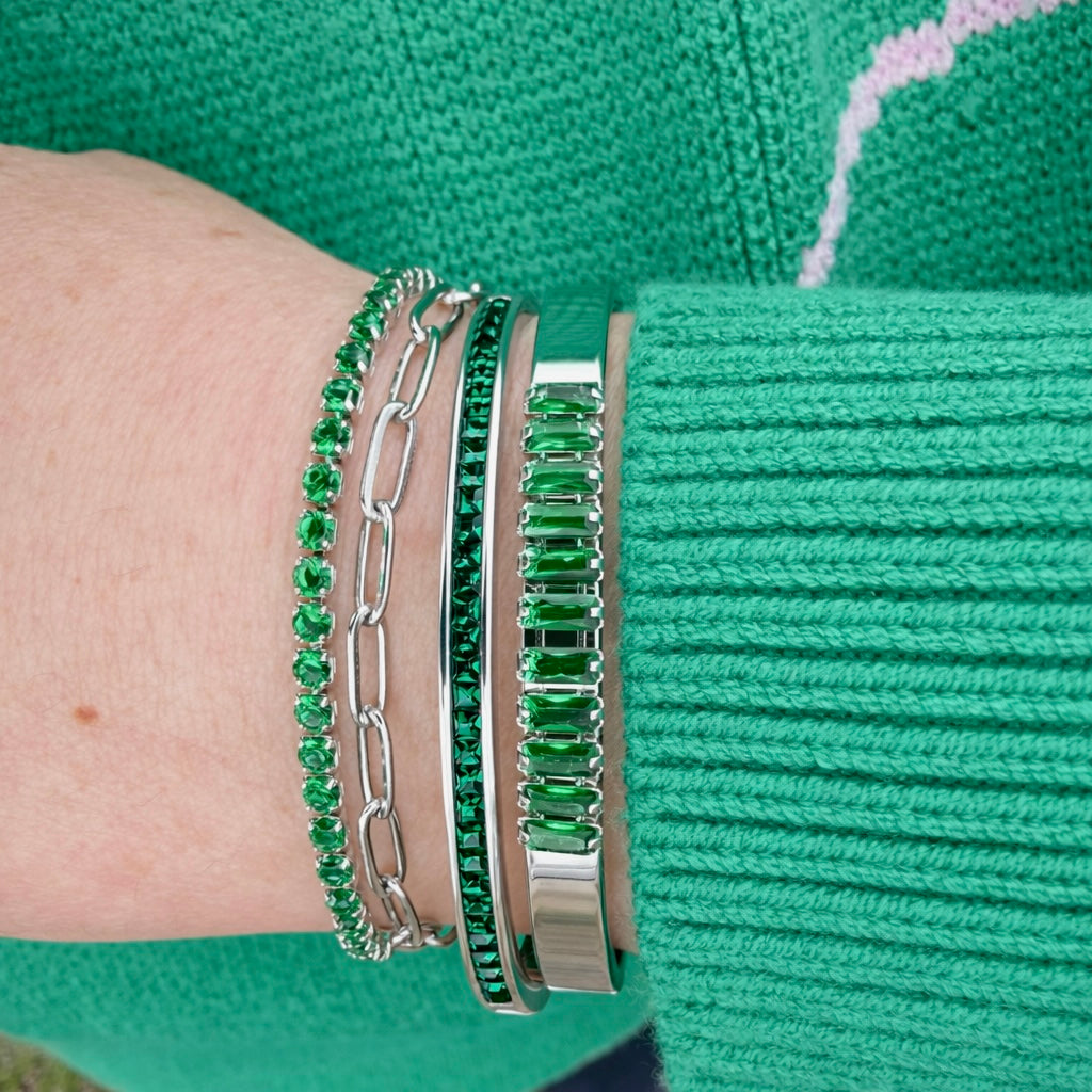 VEITA silver bracelet stack with emerald green crystal bracelets worn on wrist